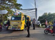 Padatnya Aktivitas Masyarakat di Pagi Hari Polantas Polsek Tamalate Mengurai Kemacetan di Persimpangan